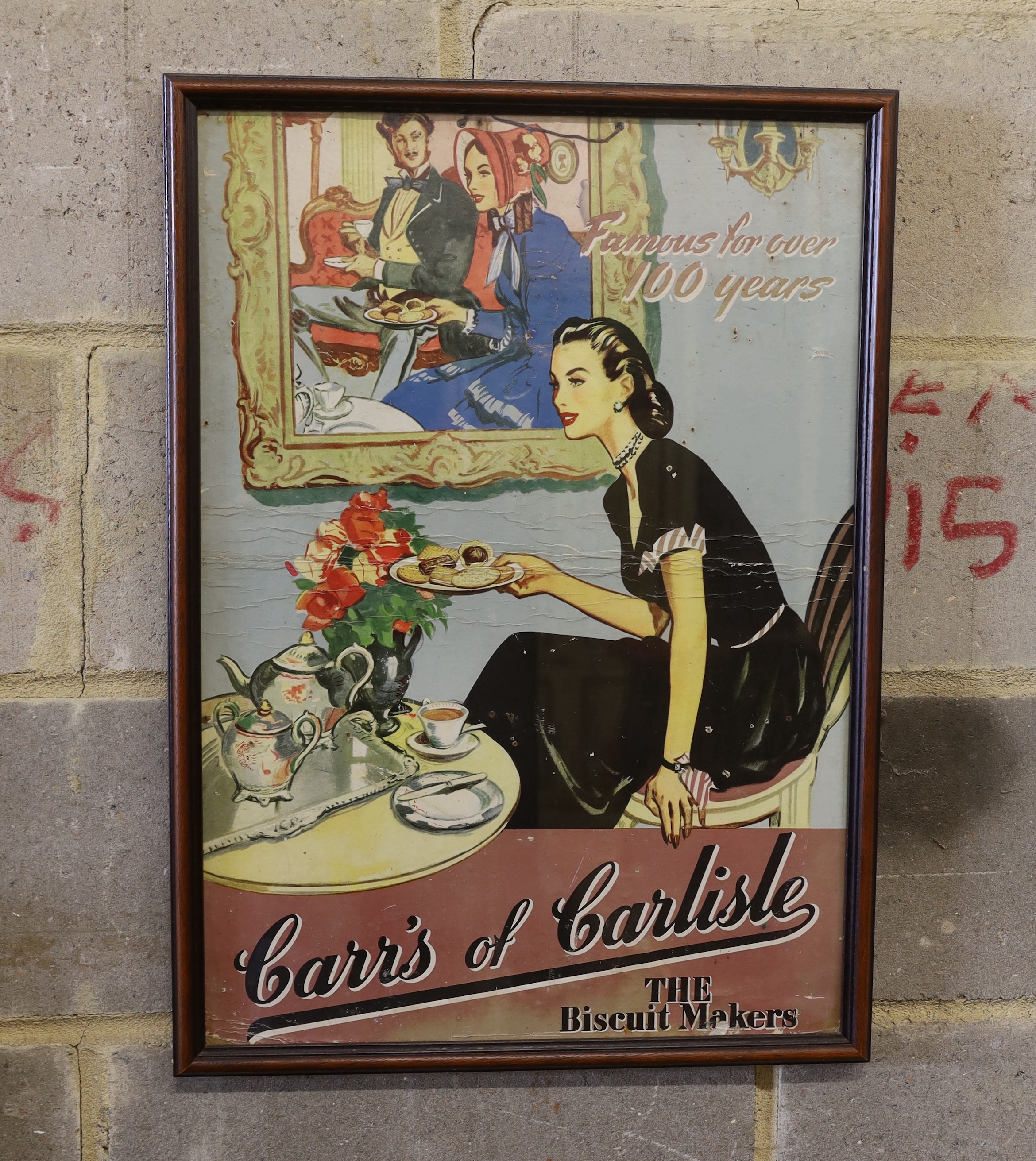 A framed and glazed paper advertising poster 'Carr's of Carlisle, the biscuit makers, Famous for over 100 years', width including frame 47cm, height 65cm